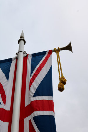 White lamp post decorated with Union Jack and gold tassels for Kings coronationの写真素材
