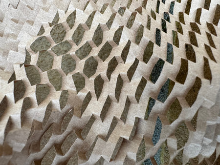 Full frame image of scrunched manilla coloured honeycomb packaging paper