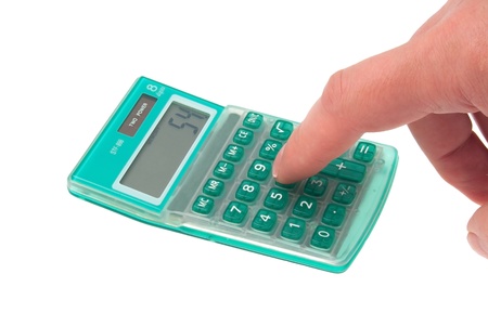 The person considers on the calculatorの写真素材