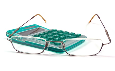 Eye glasses and the calculatorの写真素材