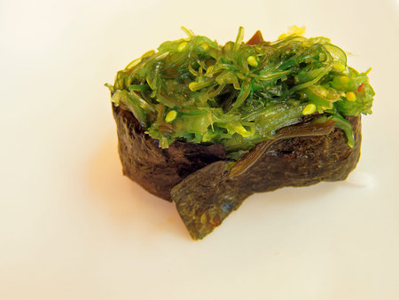 Sushi with Algae Salad on top.の写真素材