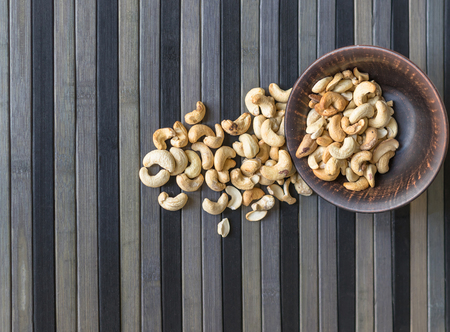 Healthy food  for background image close up cashew nuts.  Nuts texture on top view on the cup plateの写真素材