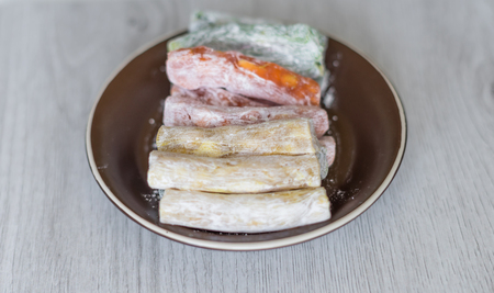 Traditional Turkish Delight. Oriental dessert on a  plate. Isolated on background. Eastern delicacy sweets. Healthy food mix assortment. Collection of different for image close up top viewの写真素材