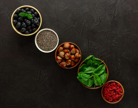 Healthy diet food, clean eating concept on black backgroundの写真素材