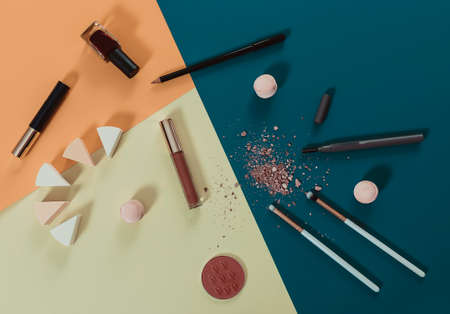 Beauty cosmetics and makeup products on a colorful background. Flat lay, top viewの写真素材