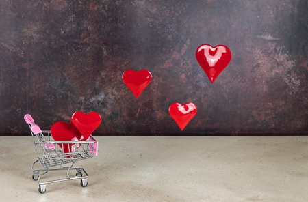 Flying hearts in the shopping cart, Valentine concept. levitation, copy space.の写真素材