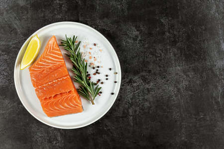 Top view of fresh raw Atlantic salmon. Great source of omega-3 fatty acids and protein. Keto diet, healthy food. copy space for recipe.の写真素材