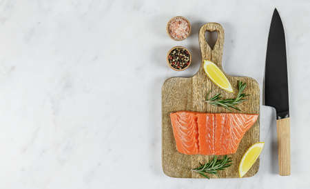 Top view of fresh raw Atlantic salmon. Great source of omega-3 fatty acids and protein. Keto diet, healthy food. copy space for recipe.の写真素材