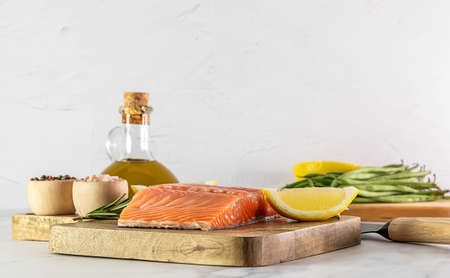 Prepare to cook raw Atlantic salmon. Great source of omega-3 fatty acids and protein. Keto diet, healthy food.の写真素材