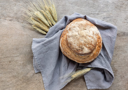 Ukrainian soft white bread. Fresh baking loaf. Homemade sourdough palaynitsa.
