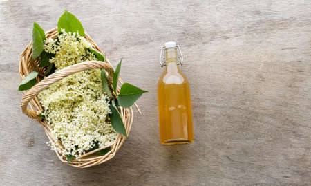 Sweet, seasonal elderflower lemonade made with cordial, lemons, and honey instead of sugar. Summer drink with edible flowers, easy to make.の写真素材