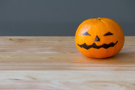 Orange with Halloween faceの写真素材