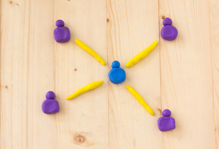 teamwork connection people , modeling clay diagram on woodの写真素材
