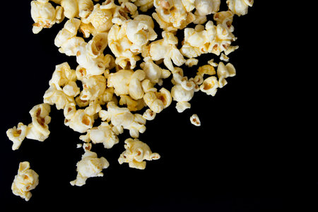 popcorn on black backgroundの写真素材