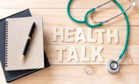 stethoscope and books with wood text  , Health Talk Conceptの写真素材