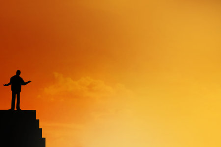 Silhouette of  Businessman stand on the top of stairs , archievement , success and leadership concept.の写真素材