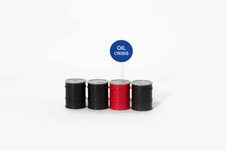 Oil tanks with message Oil Crisis.の写真素材