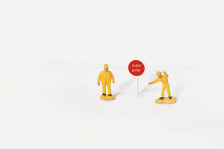 small figures worker work on road with message DO NOT ENTER , work in progress conceptの写真素材