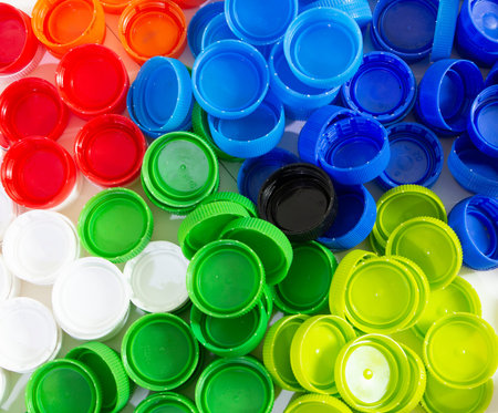 pile of many color of plastic caps, plastic caps for recycle