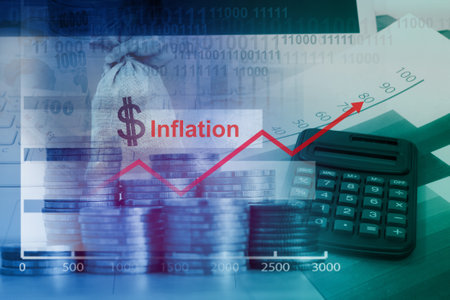 increasing graph of economic inflation rate with pile of money and calculatorの写真素材