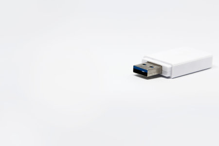 USB memory stick, digital data storage drive on white background