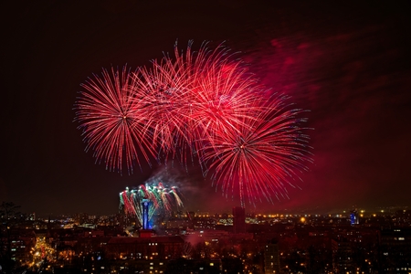 Firework on the night sky with Ostrava city and city hall tower.の写真素材