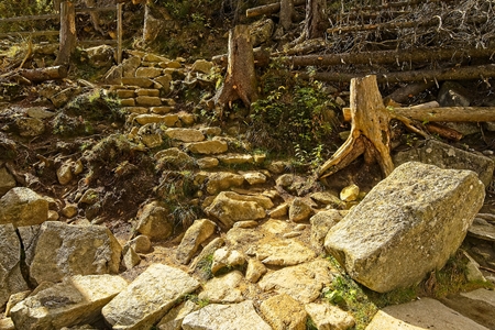Stone steps on a track path at High Tatras mountains near Hrebienok and Cold Creak waterfalls.の写真素材