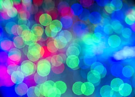 Blured bright and dark colorful background - selective focus photo of fiber optics led light.の写真素材