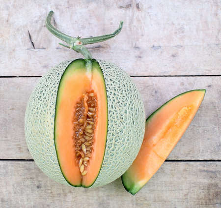 Melon on a wooden floorの写真素材
