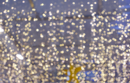 Christmas light background. Holiday glowing backdrop. Defocused Background With Blinking Stars. Blurred Bokeh abstract blurred light element for cover decoration or backgroundの写真素材