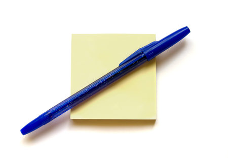 Isolated pen and note stick on isolated background