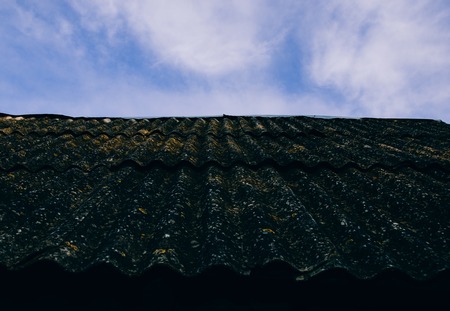 Vero old roof in the village on the sky backgroundの写真素材