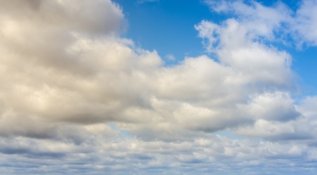 Many clouds on the blue summer skyの写真素材