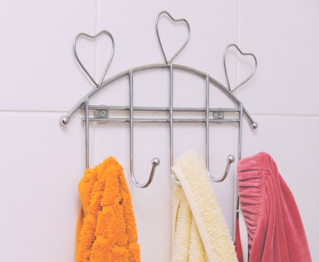 Color textile towels in the home bathroomの写真素材