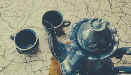 Photo of the cups and kettle in vintage styleの写真素材