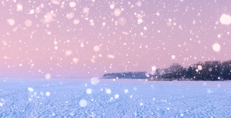 Beautiful landscape on the frozen sea in snowfall timeの写真素材