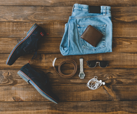 cool fashion men's casual outfit on wooden table,の写真素材