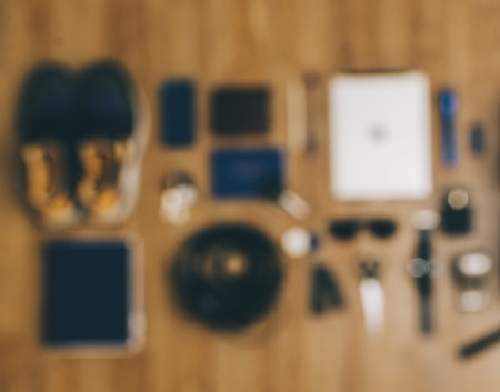 Blurred outfit from bag on wooden backgroundの写真素材