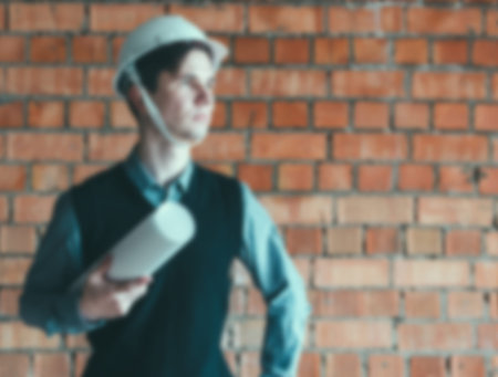 Blurred defocused photo portrait of the engineer