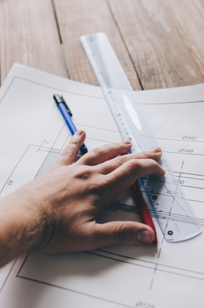 View of hands drawing with architecture hand-drawn sketchの写真素材