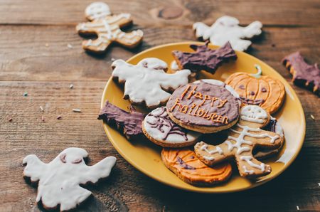 Halloween cookies on home kitchen rustic tableの写真素材