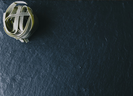 pasta on the black stone desk on kitchen tableの写真素材