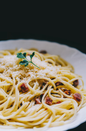 Pasta carbonara with parsley in panの写真素材