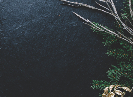 Christmas tree decoration on dark stone backgroundの写真素材