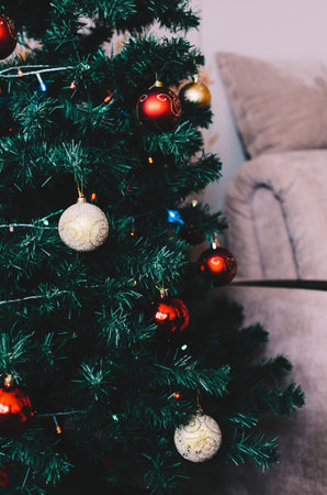 Christmas ren, gold and green decoration tinsel  and balls for treeの写真素材