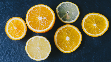 Orange and limon on dark backgroundの写真素材