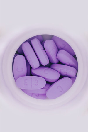 Blue tablets on table, medicine conceptの写真素材