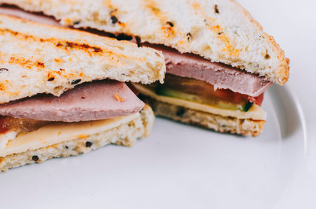 Sandwiches on wooden desk on kitchen home tableの写真素材