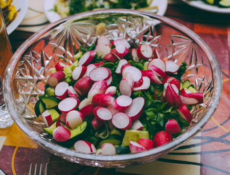 Plate with salad on home kitchen table