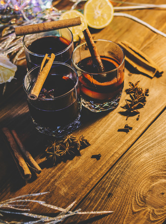 Alcohol mulled wine on the home wooden tableの写真素材